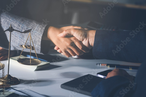 Fotografie Businesswoman and Male lawyer or judge consult and conference having team meetin