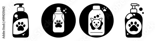 Set of four black and white pet travel bottles with paw prints isolated on white background for pet care and hygiene