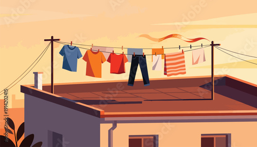 Clothes drying on a line atop a building against a warm, hazy sky