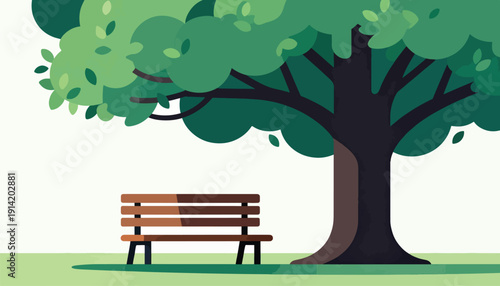 A solitary park bench rests beneath the shade of a large, leafy tree