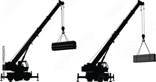 Two cranes lifting heavy loads in a construction site