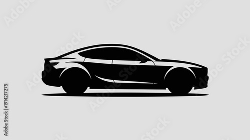 A sleek black car silhouette against a plain background