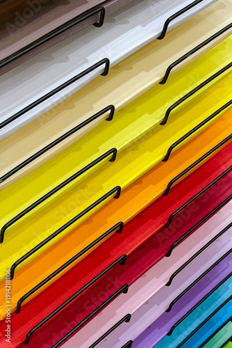 Stacks of colored paper on shelves