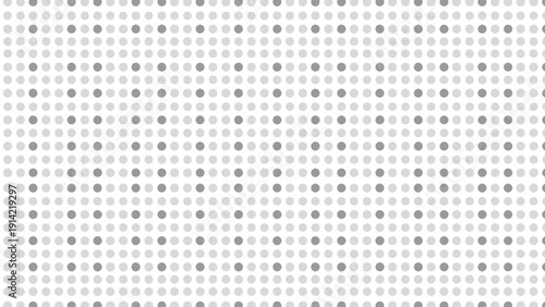 Grayscale image of evenly spaced dots forming a grid pattern on a white background. The dots vary slightly in shade, creating a neutral, balanced visual effect.
