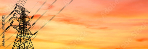 Wallpaper Mural High voltage pylon and power lines against a vibrant sunset sky. The metal structure contrasts beautifully with the warm colors Torontodigital.ca