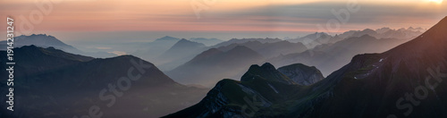Sunset over the Bernese alps with mountains Wildgaerst and Schwarzhorn in the foreground