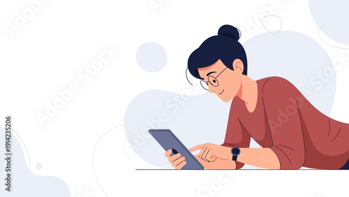 Young Woman Using Tablet Computer, Relaxed Lying Down, Online Browsing