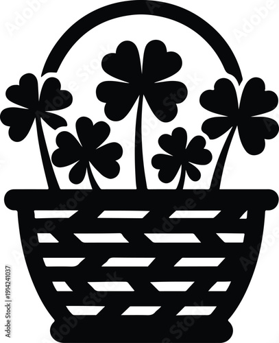 Basket filled with clover leaves for Saint Patricks Day celebration and good luck charm concept