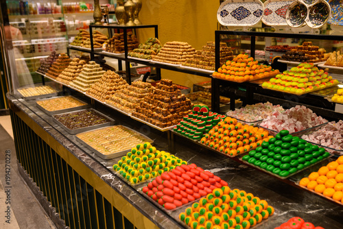 Canvastavla Glass-fronted display of confectionery, showcase of delicacies
