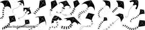 Vector set of flying kites with decorative tails and leaf elements. Black silhouettes isolated on light background. Playful wind and sky themed design.