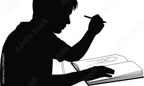 Young male artist creates a drawing in his sketchbook with pencil