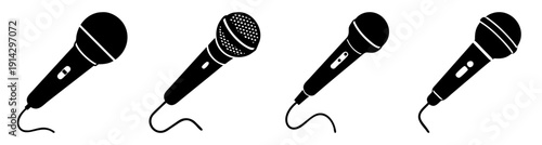 Set of four black microphones isolated on white background for recording, podcast, broadcast, and presentation