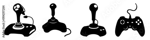 Set of four black gaming joysticks controllers isolated on white background for video games and esports