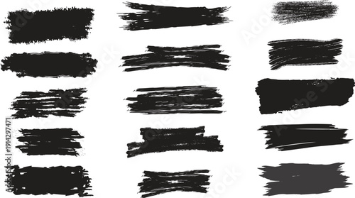 Collection of black brush strokes and smudges on white background for graphic design