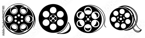 Vintage black and white film reels set isolated on dark background for retro cinema photography