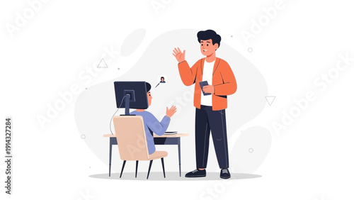 Two men interacting in a modern office space, one seated at a computer, the other standing.