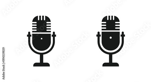 Two vintage microphones in a bold black silhouette