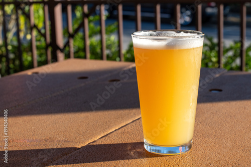 Εκτύπωση καμβά A tall, cold glass of hazy IPA beer with froth on top