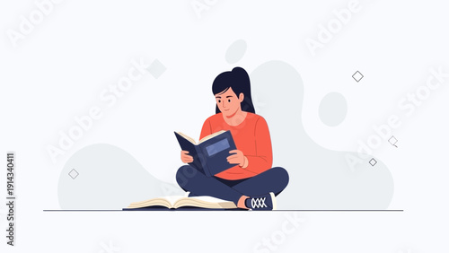 Young Woman Reading Book Sitting Cross-Legged