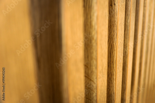 Wooden slats texture background with beautiful depth of field focused on the slats