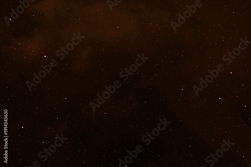 Brown red galaxy space background. Starry night sky. Photo can be used for the concept of Christmas, New Year, Valentines and all celebrations backgrounds.