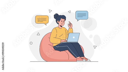 Young woman working on laptop on bean bag chair, communicating via chat bubbles