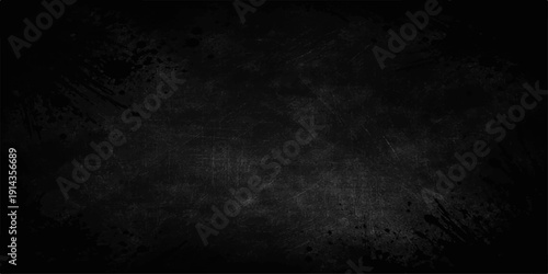 Vintage dark grunge background featuring a textured black and white concrete wall surface with a rough old stone pattern for a blank dirty gray design backdrop