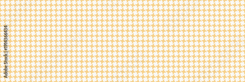 Elegant pale gold houndstooth pattern. Perfect for textile design, website backgrounds, or fashion projects.  Subtle texture adds sophistication.  Ideal for creating a refined, classic aesthetic.