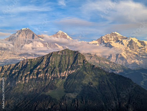 Wallpaper Mural Famous mounts Eiger, Moench and Jungfrau in the Swiss alps, mount Maennlichen in the foreground Torontodigital.ca