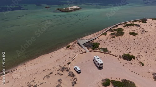 Wallpaper Mural Aerial shot of the Eagle Bluff Lookout boardwalk to a sandy cliff lookout overlooking clear turquoise Waters of Henri Freycinet Harbour, Denham, Francois Peron NP, Shark Bay, Western Australia. Torontodigital.ca