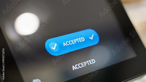 Person confirming a transaction on a touchscreen display