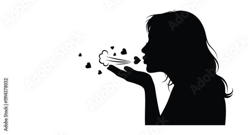 Woman blowing a kiss depicted in a striking black silhouette