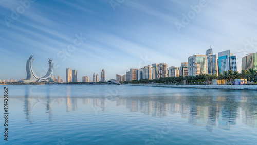 the newly developed lusail city with winter wonderland and crescent tower in the background.