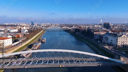 Aerial drone flying over bridges on Vistula River in Krakow winter
