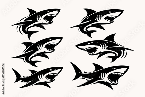 Set of aggressive shark silhouettes in side view. Black vector mascot icons for sports teams, fishing brands and marine themed designs.