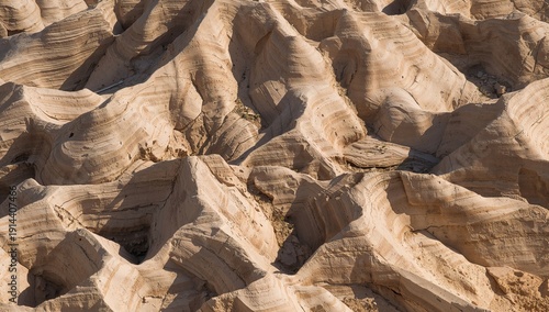Sand Formations Show Unique Lines and Shapes in Desert Landscape During Brigh...