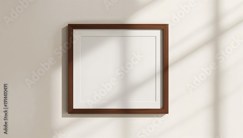 Empty Frame on a Wall With Shadows and Light During the Day