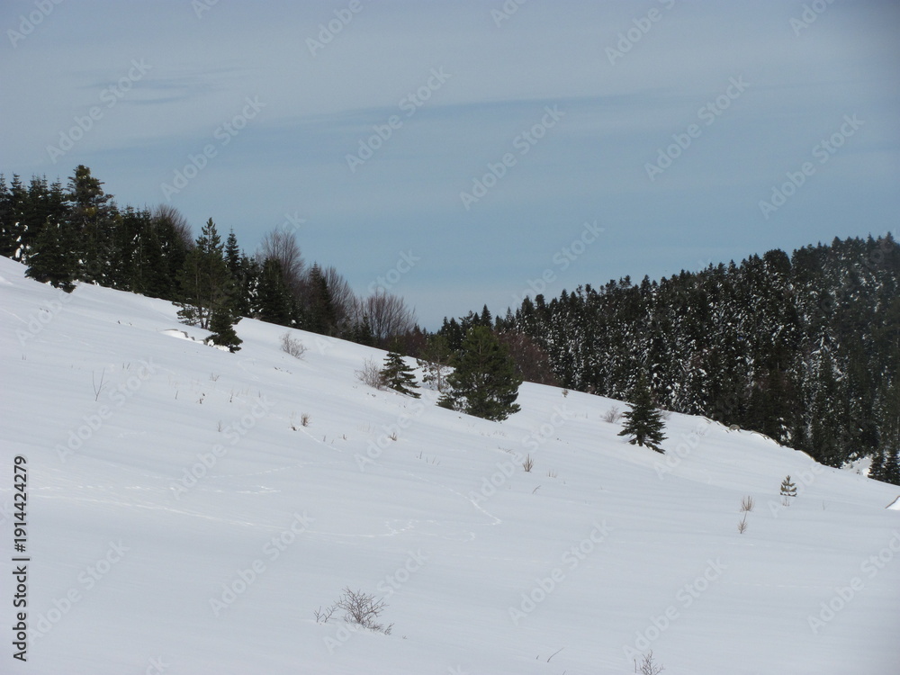 Obraz premium Dramatic Clouds over High Altitude Mountain Peaks