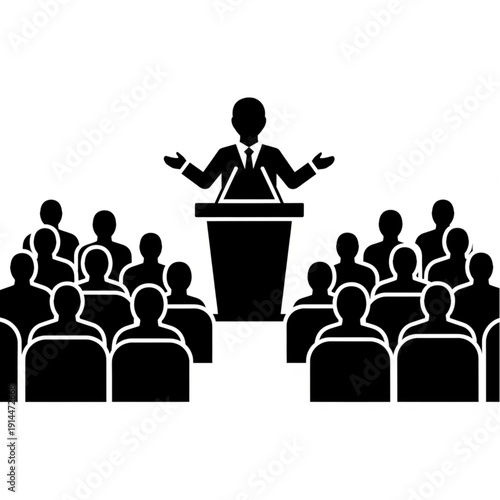 Businessman giving a presentation to a group of people at a conference.
