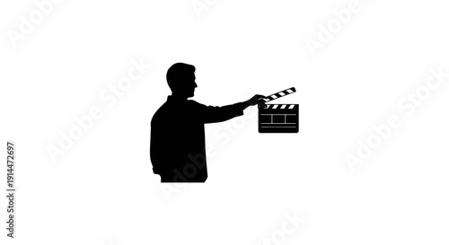 Silhouette of a Person Holding a Film Clapperboard