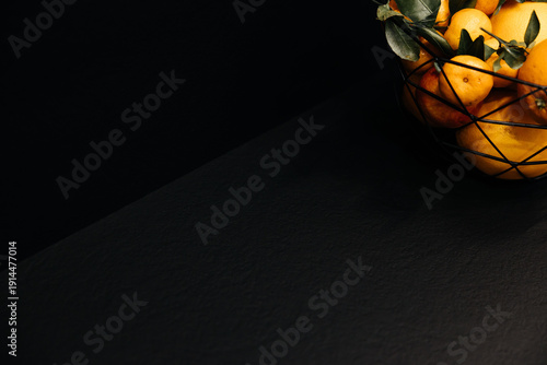 Modern luxury kitchen interior with beige cabinets and navy blue island.