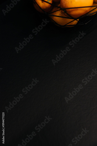 Modern luxury kitchen interior with beige cabinets and navy blue island.