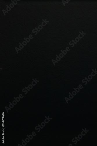 Modern luxury kitchen interior with beige cabinets and navy blue island.