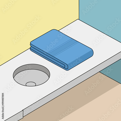 Blue towel on a white bathroom counter with sink.