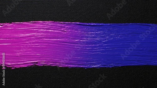 Vibrant Pink and Blue Brush Stroke on Black Background.
