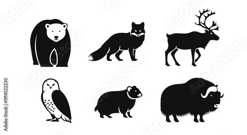 Black and white silhouette illustration of a collection of arctic animals including a polar bear arctic fox reindeer snowy owl lemming and muskox