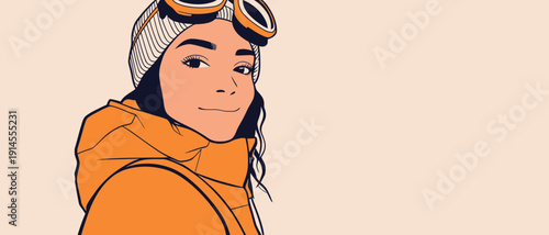 A person stands smiling while wearing ski goggles and a winter jacket. The setting is cold, suggesting a snowy environment.