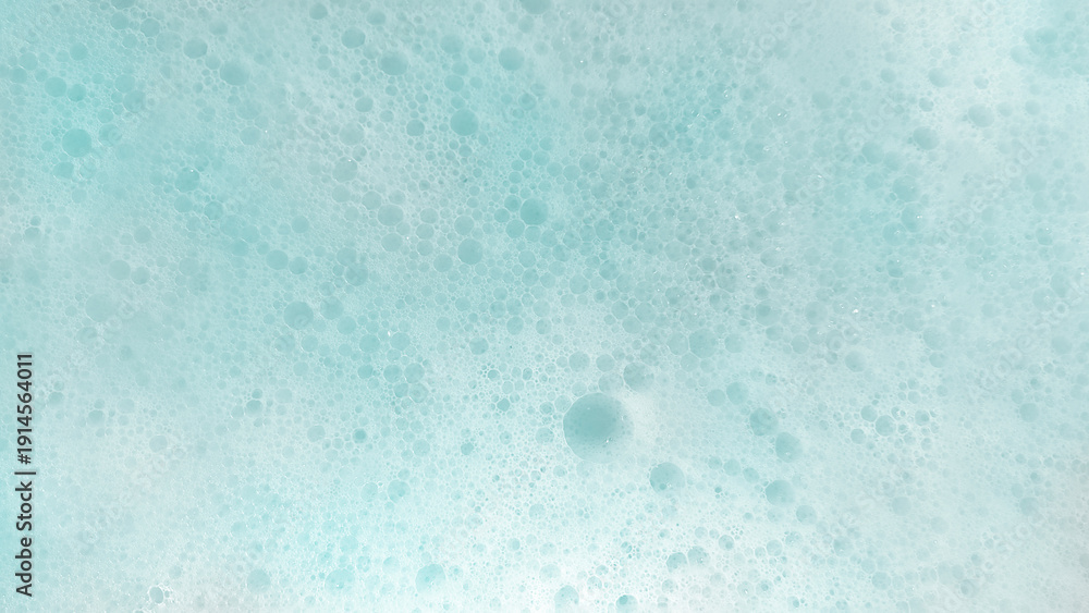 Obraz premium 石鹸や洗剤などの一面が細かな泡と大小様々な泡の画像素材 背景・テクスチャー 16:9・8K UHDサイズ（7680 x 4320）水色・ライトブルー・シアン・青緑・ブルーグリーン・ミント・パステル