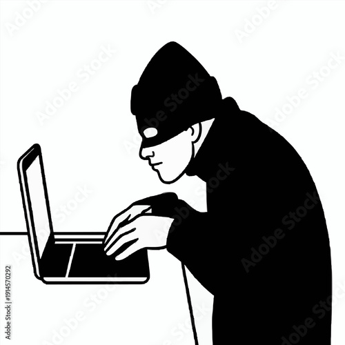 Hacker at Laptop - Cybercrime & Data Security Concept