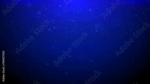 Deep blue abstract vector background featuring floating dust particles and soft bokeh light effects. Dark navy atmospheric texture suitable for space or sea.